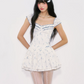 White Floral Corset Mini Dress with Ruffled Trim Neckline, Puff Cap Sleeves, Pleated Skirt and Smocked Back R9252