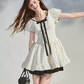 White Polka Dot Mini Dress with Black Bow and Puff Sleeves R9213