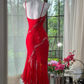 Red halter-neck fitted long ball gown with an asymmetrical hem R7680