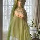 Light yellow-green halter-neck fitted long ball gown with an asymmetrical hem R7679