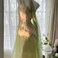 Light yellow-green halter-neck fitted long ball gown with an asymmetrical hem R7679