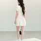 Fitted Polka Dot Flounce Dress with Neck Ribbon and Button Accents R9218