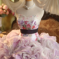 Light purple strapless ball gown with a cinched waist and a voluminous puffy skirt; bridal gown R7281