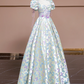 Off-white base with light purple butterfly print, fitted waist, long ball gown with a full skirt R8337