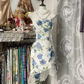 White dress with blue floral print, halter neck, fitted waist, short ball gown R7447