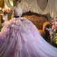 Light purple strapless ball gown with a cinched waist and a voluminous puffy skirt; bridal gown R7281