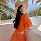 Orange V-neck French puff sleeve dress Hot girl hollow waist design high-end seaside holiday dress R0202