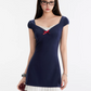 Edgy Preppy Navy Blue Mini Dress With Form-Fitting Silhouette And Red Bow Accent R9311