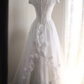 White fitted long ball gown with beaded details exudes elegance R6690