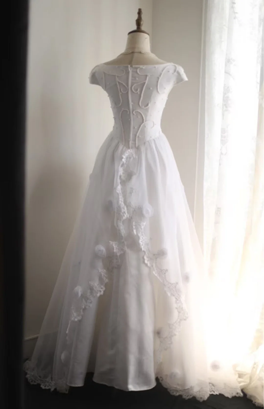 White fitted long ball gown with beaded details exudes elegance R6690