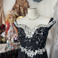 Black halter-neck lace design, fitted waist, irregular hem ball gown R6370