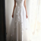 White fitted long ball gown with beaded details exudes elegance R6690