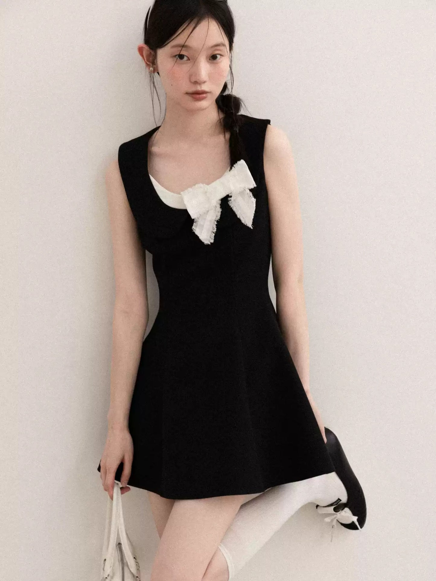 Black Sleeveless A-Line Dress with White Bow Accent R9171