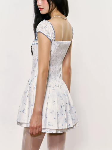 White Floral Corset Mini Dress with Ruffled Trim Neckline, Puff Cap Sleeves, Pleated Skirt and Smocked Back R9252