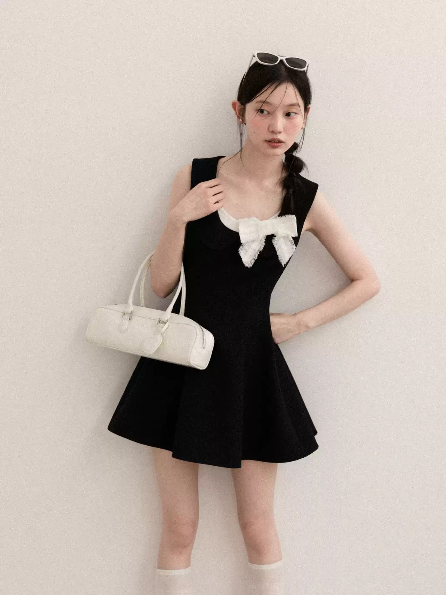 Black Sleeveless A-Line Dress with White Bow Accent R9171