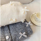 Design bow sweater coat women's long-sleeved knitted cardigan trendy    S4857