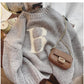 Simple embroidered round neck sweater for women       S4894