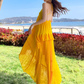 Yellow V-neck design backless dress tutu skirt irregular pleated beach suspender dress R0200