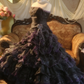 Black strapless ball gown with a cinched waist and a tiered cake skirt; bridal gown R7284