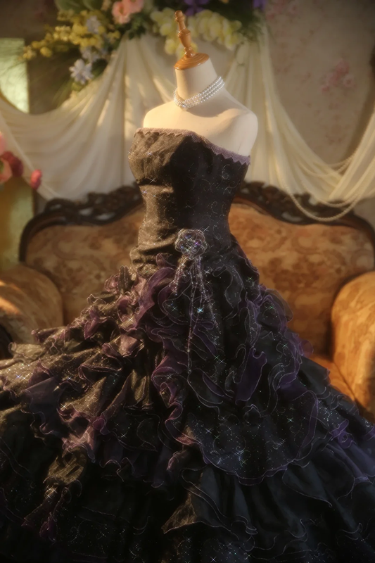 Black strapless ball gown with a cinched waist and a tiered cake skirt; bridal gown R7284