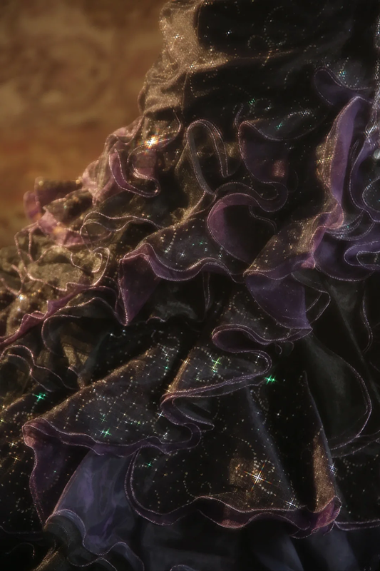 Black strapless ball gown with a cinched waist and a tiered cake skirt; bridal gown R7284