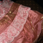 Gold and pink strapless long ball gown with a cinched waist and pleated skirt R6971
