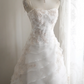 White strapless embroidered A-line ball gown with a fitted waist and full skirt R6771
