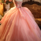 Pink floral-patterned strapless ball gown with a cinched waist and a voluminous puffy skirt; bridal gown R7285