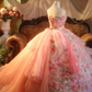 Pink floral-patterned strapless ball gown with a cinched waist and a voluminous puffy skirt; bridal gown R7285