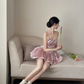 Champagne pink spaghetti strap, waist‑cinching, short ball gown with a fluffy, ruffled bud‑style skirt R7999