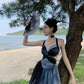 Holiday halter dress with open back for seaside travel wear beach skirt atmosphere R1569
