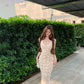 Temperament V-neck three-dimensional flower suspender dress with waist and slim fit hip skirt R0540