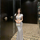 A blue V-neck short-sleeved top and skirt with a sense of luxury R0841