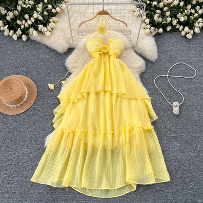 Holiday dress hollow chest-revealing halter neck suspender three-dimensional flower long dress R2336
