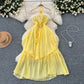 Holiday dress hollow chest-revealing halter neck suspender three-dimensional flower long dress R2336