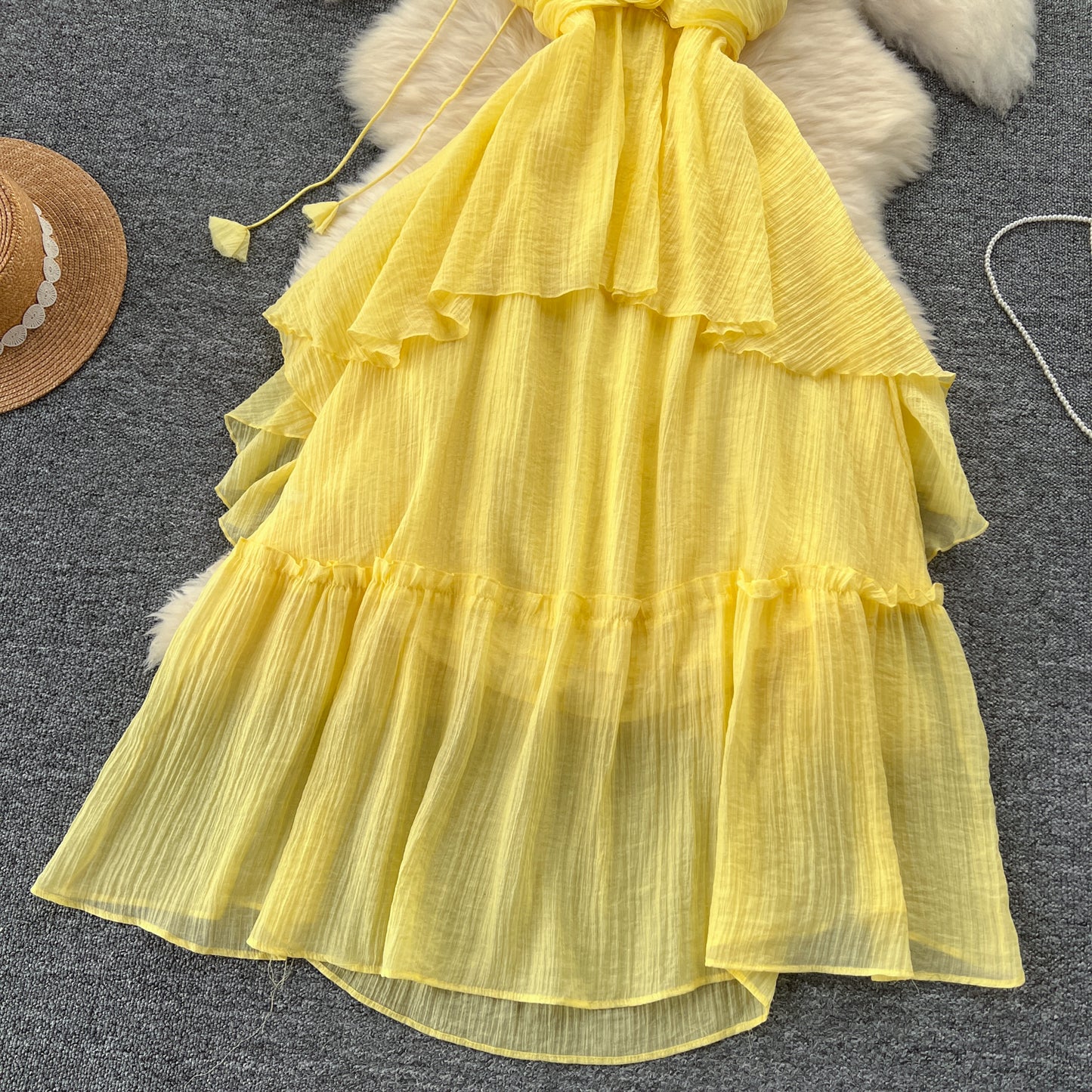 Holiday dress hollow chest-revealing halter neck suspender three-dimensional flower long dress R2336