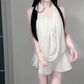 A complete set of pure and relaxed white halter top and short skirt two-piece suit R0833