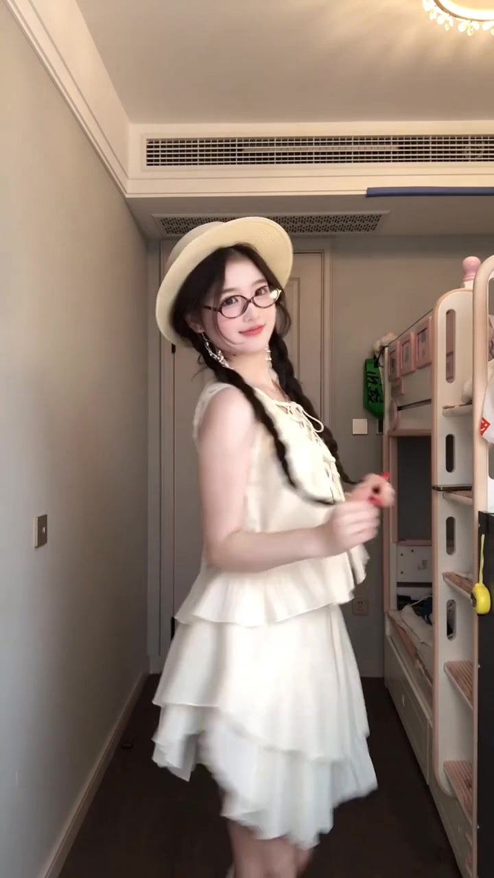 Travel wear beautiful sleeveless vest irregular short skirt two-piece suit female 2025 R0838