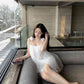 Gentle temperament white suspender dress 2025 new beautiful loose bud short skirt R0777