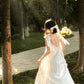 White moonlight three-dimensional suspender dress 2025 new irregular white niche long skirt R0160