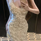 Temperament V-neck three-dimensional flower suspender dress with waist and slim fit hip skirt R0540