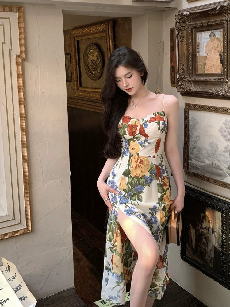 Seaside vacation floral suspender dress summer new slit long party dress      S5808