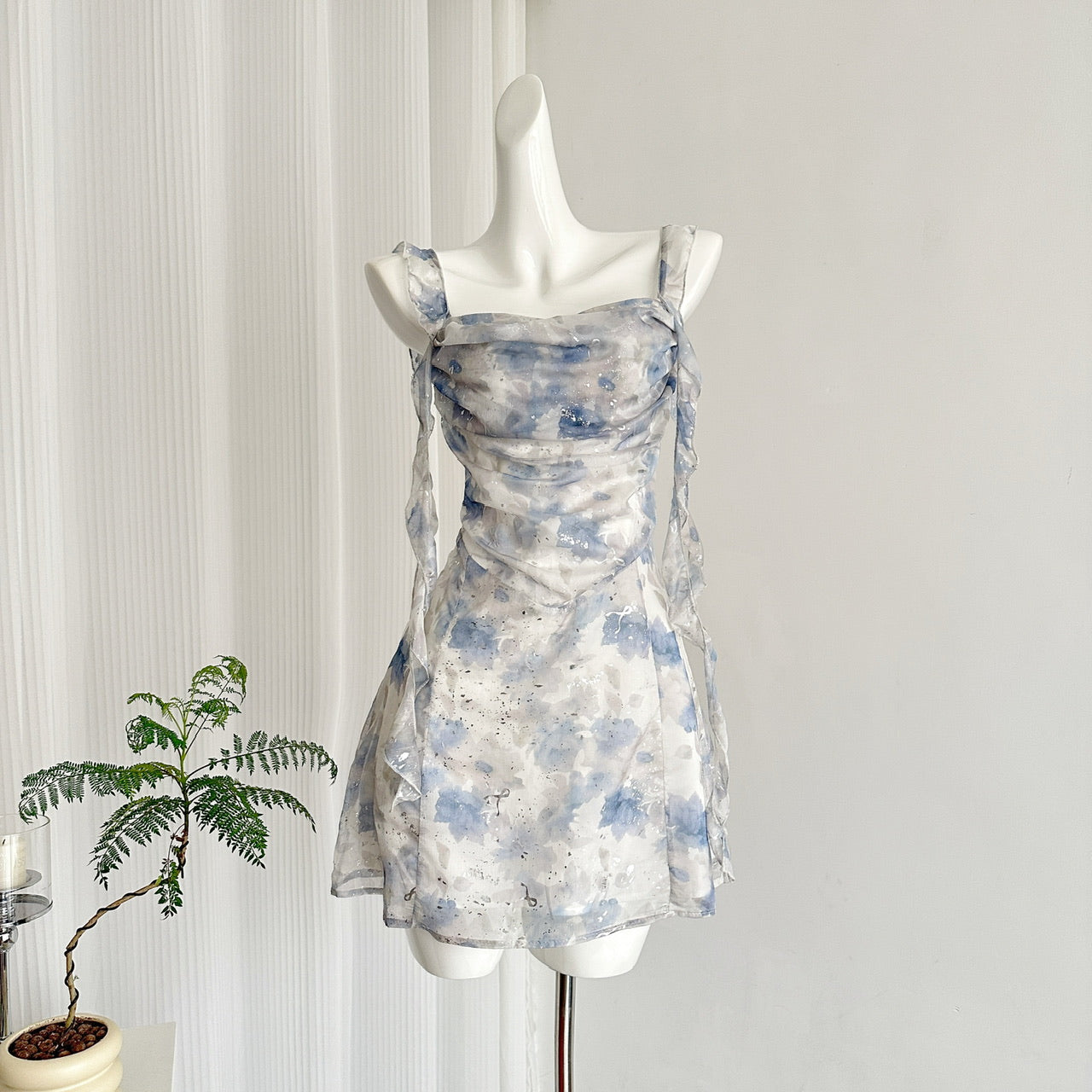 Holiday style floral suspender dress with flared neckline R1982