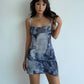 Newspaper mesh suspender short skirt hot girl hip-hugging figure dress European and American style R3041