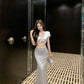 A blue V-neck short-sleeved top and skirt with a sense of luxury R0841