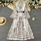 New retro printed round neck trumpet sleeve dress with large swing irregular pleated long skirt R2150