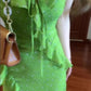 Green floral suspender dress with ruffles and gentle waist and hip skirt R0621