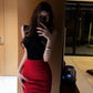 Slim-fitting black sleeveless top and red hip-hugging skirt are a complete set R0726
