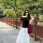Gentle temperament black off-shoulder T-shirt A-line skirt 2025 two-piece suit R0887