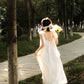 White moonlight three-dimensional suspender dress 2025 new irregular white niche long skirt R0160